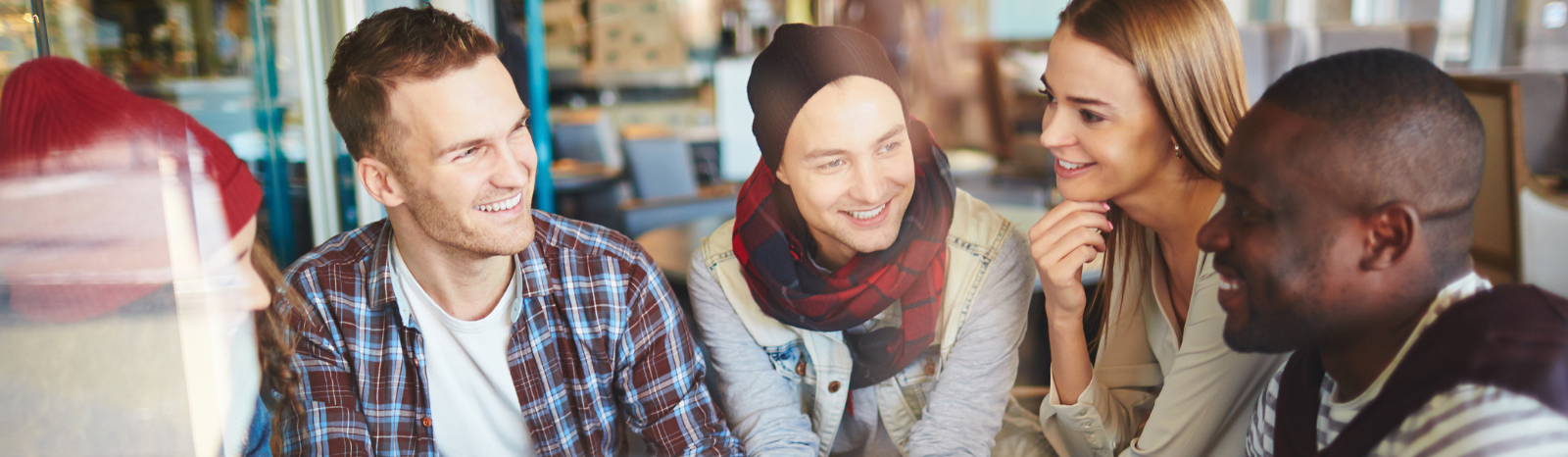 group of people talking and smiling