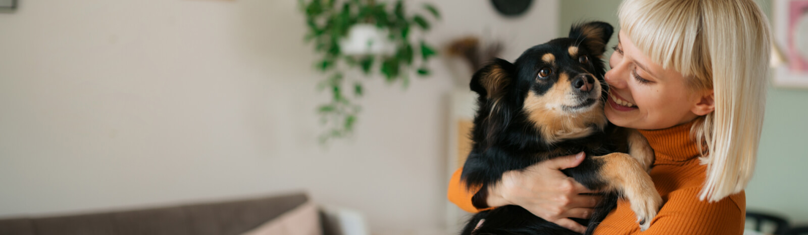 Female holding dog